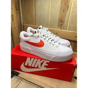 Nike Women's White Sneakers with Orange Swoosh Athletic Shoes